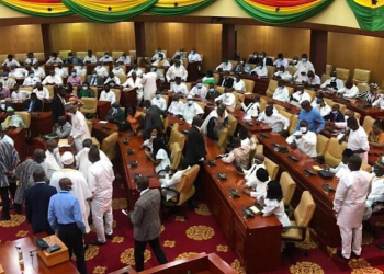 Ghana’s Parliament Erupts into Chaos as NDC MP whisks away Speaker’s seat